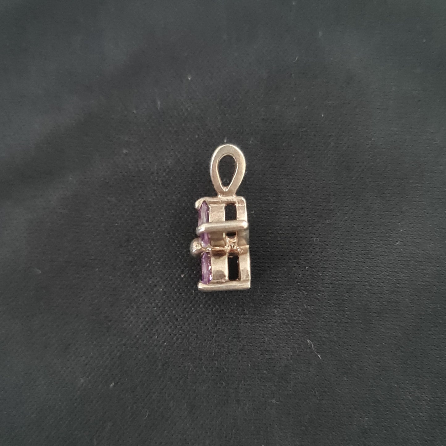 Sterling Silver Flower Pendant with Purple Stones