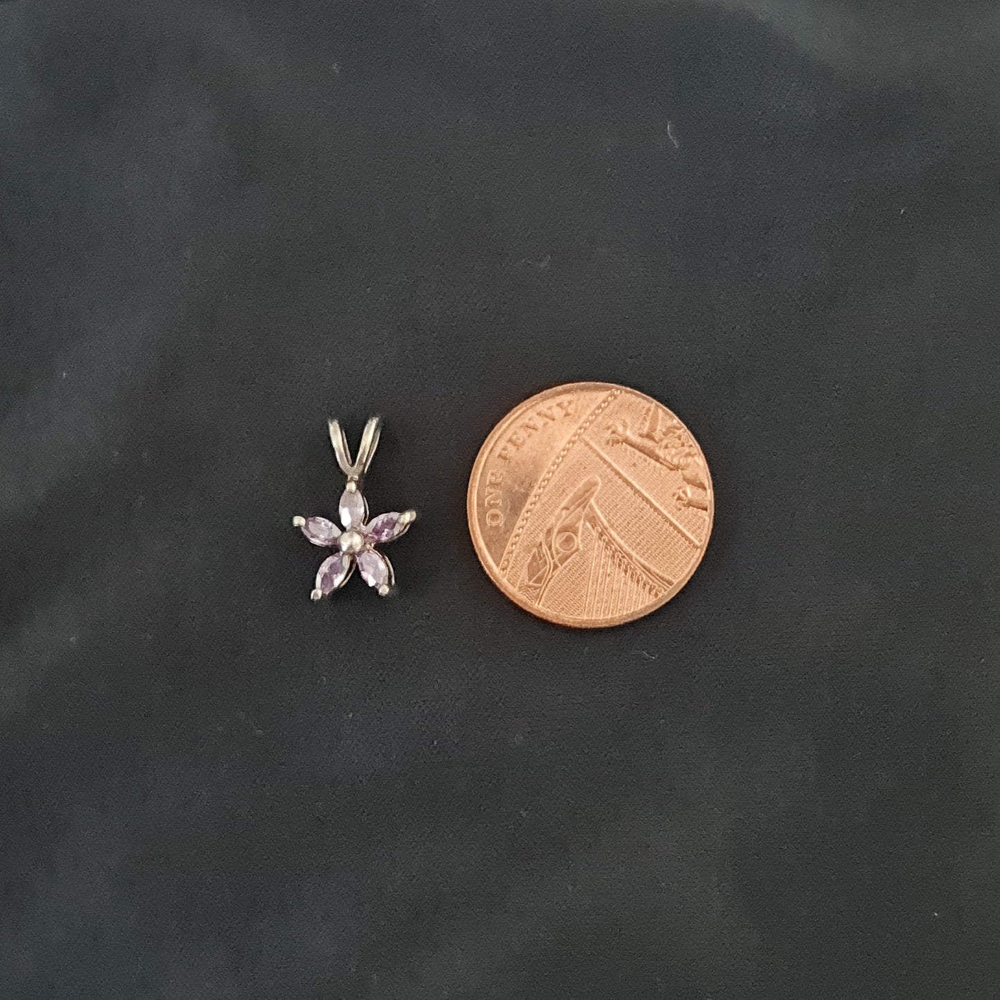 Sterling Silver Flower Pendant with Purple Stones
