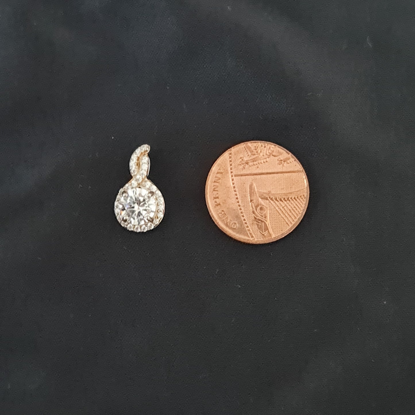 Silver Swirl Pendant with Clear Stones