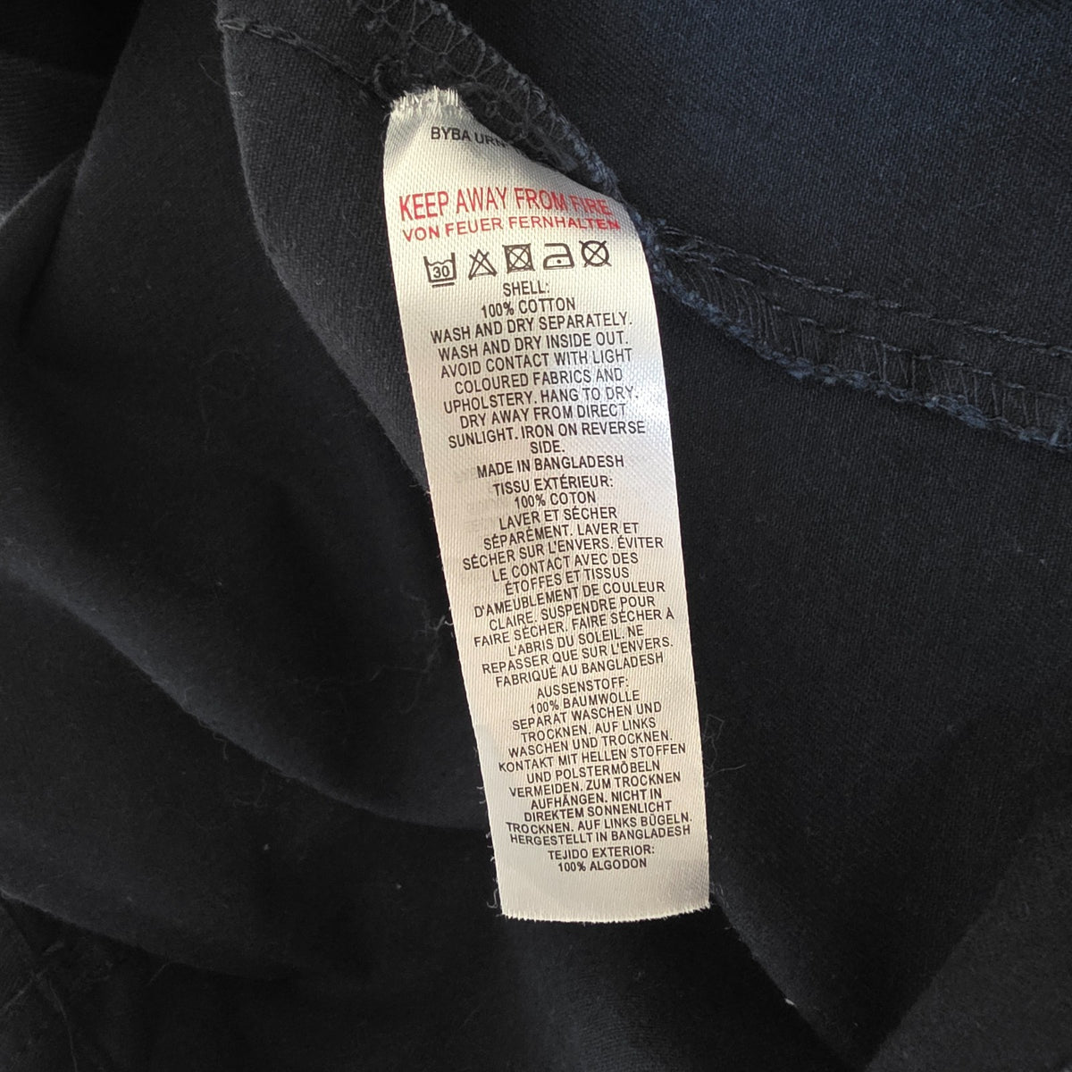 French Connection blue chore jacket with three patch pockets and metal button fastening.