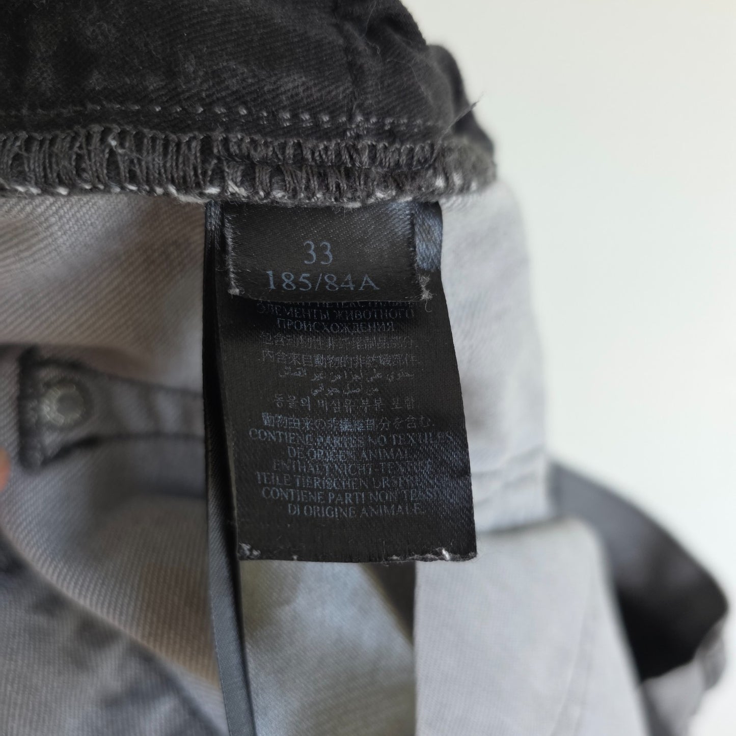 AllSaints grey slim jeans with button fly and stretch cotton elastane blend.