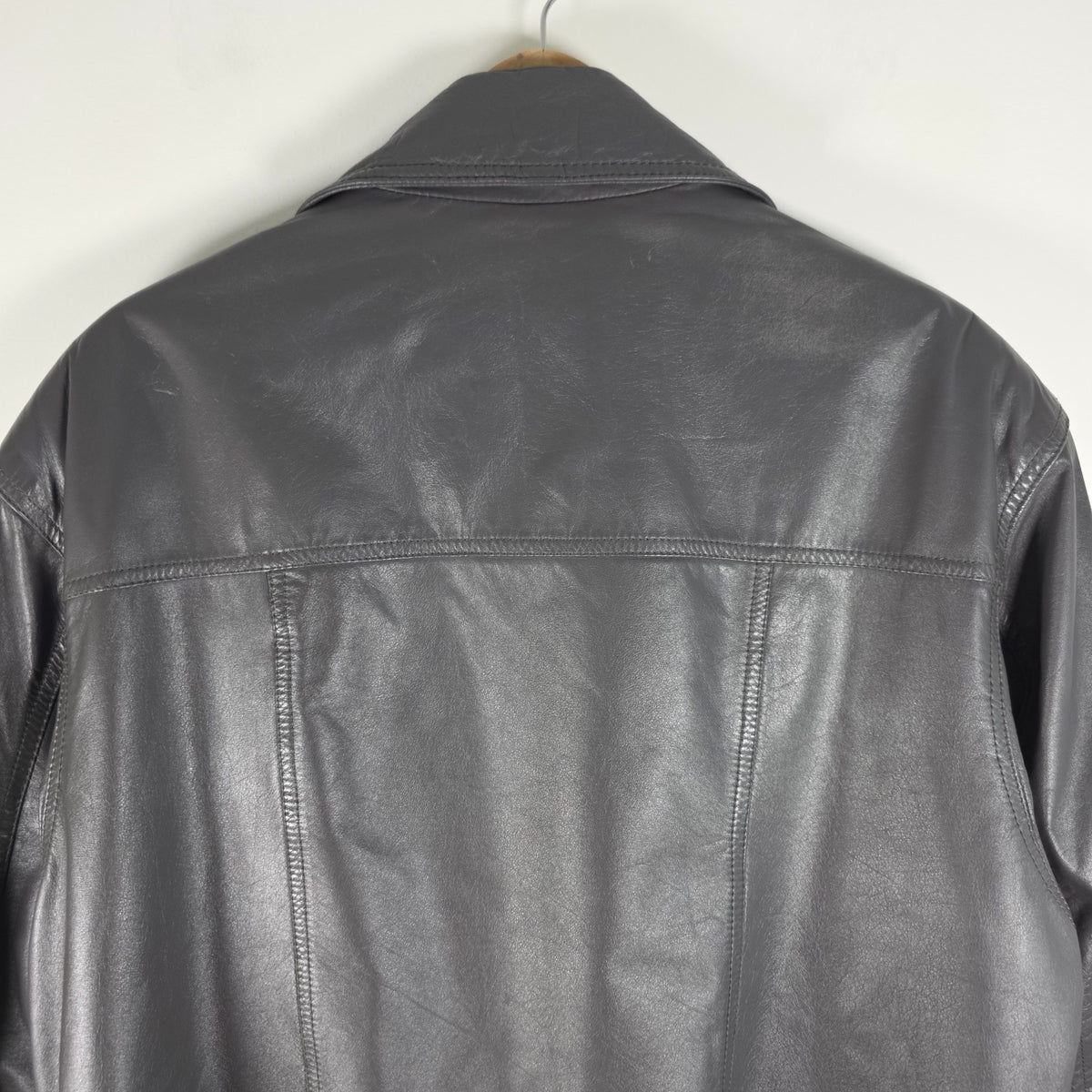 St Michael grey leather bomber jacket with utility pockets and elasticated waistband.