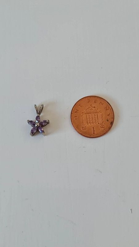 Sterling Silver Flower Pendant with Purple Stones