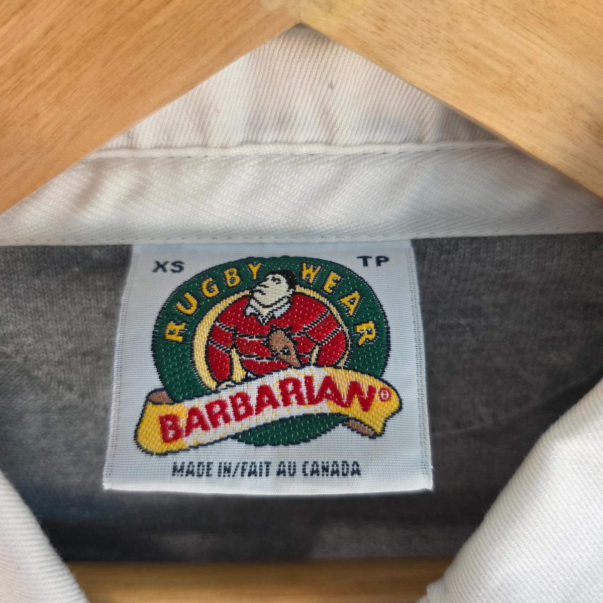 Barbarian Rugby Wear grey and pink rugby polo with Dalhousie University logo, 100% cotton.