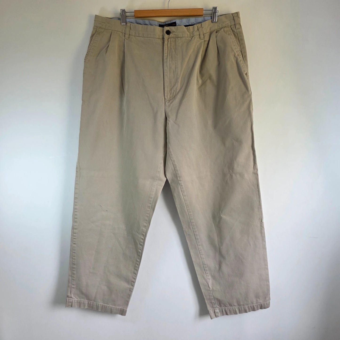 Tommy Hilfiger beige chino trousers pleated front, 100% cotton, relaxed fit.