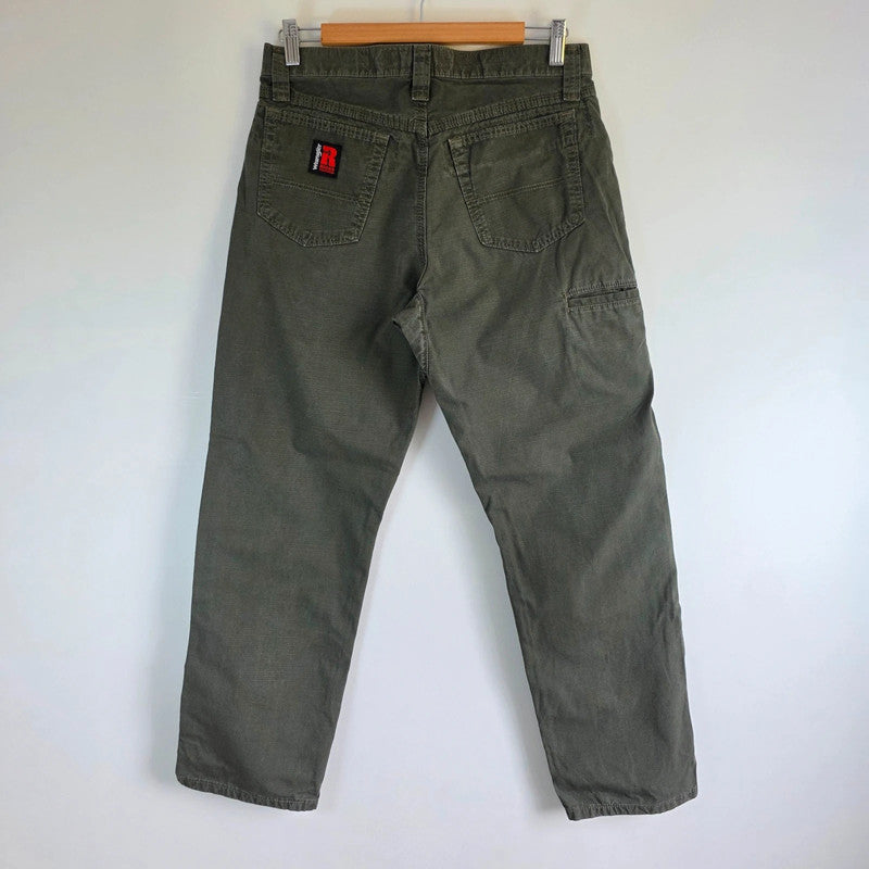 Wrangler khaki straight jeans with utility pockets and sturdy fabric.