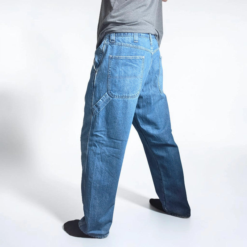 Wrangler blue straight jeans fleece lined with utility pockets and light wear.