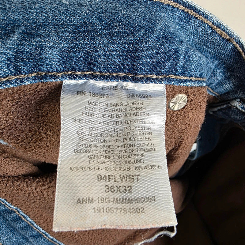 Wrangler blue straight jeans fleece lined with utility pockets and light wear.