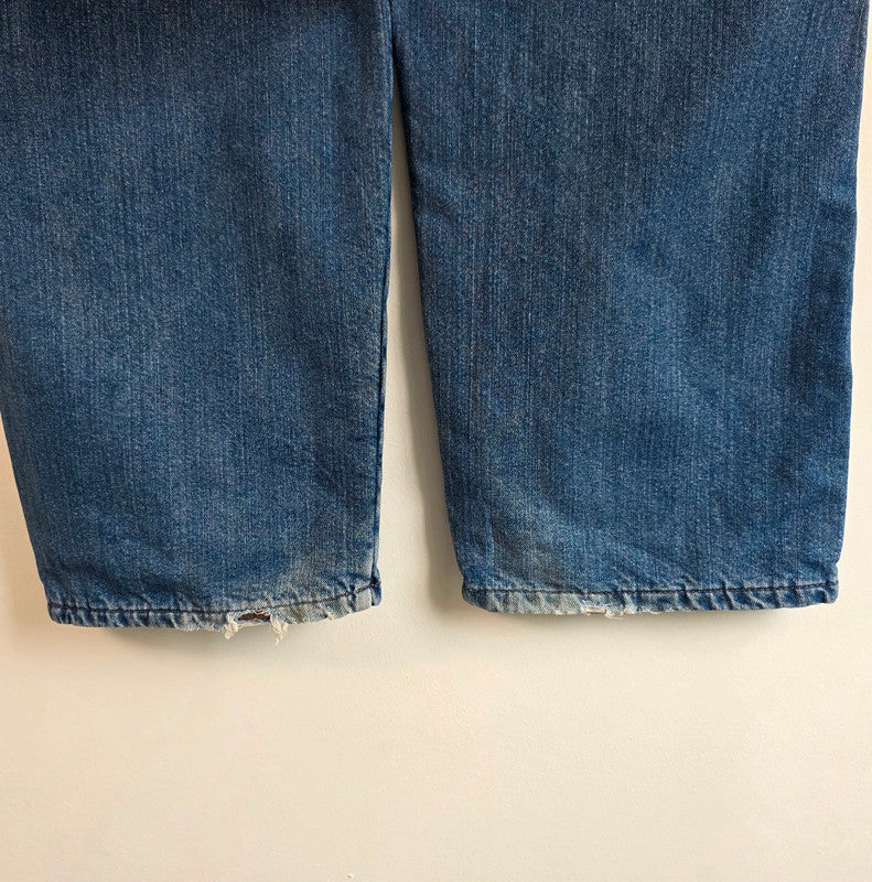 Wrangler blue straight jeans fleece lined with utility pockets and light wear.