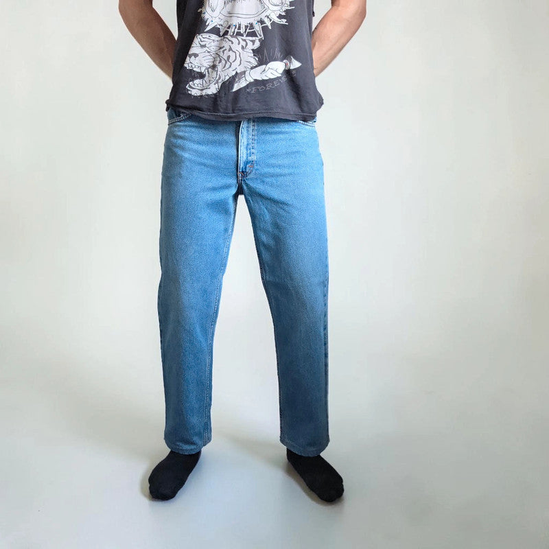 Robe Di Kappa blue straight jeans with vintage logo patch and cotton material.