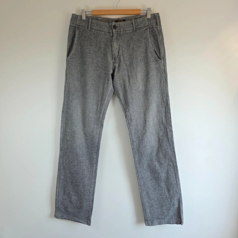 Diesel grey cotton trousers with slim straight fit and subtle wear details.
