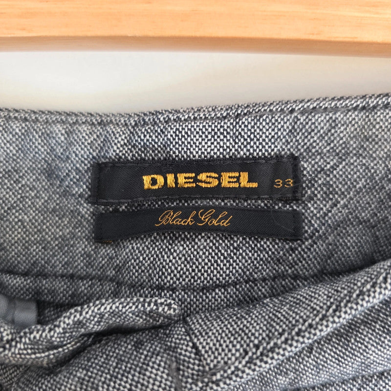 Diesel grey cotton trousers with slim straight fit and subtle wear details.