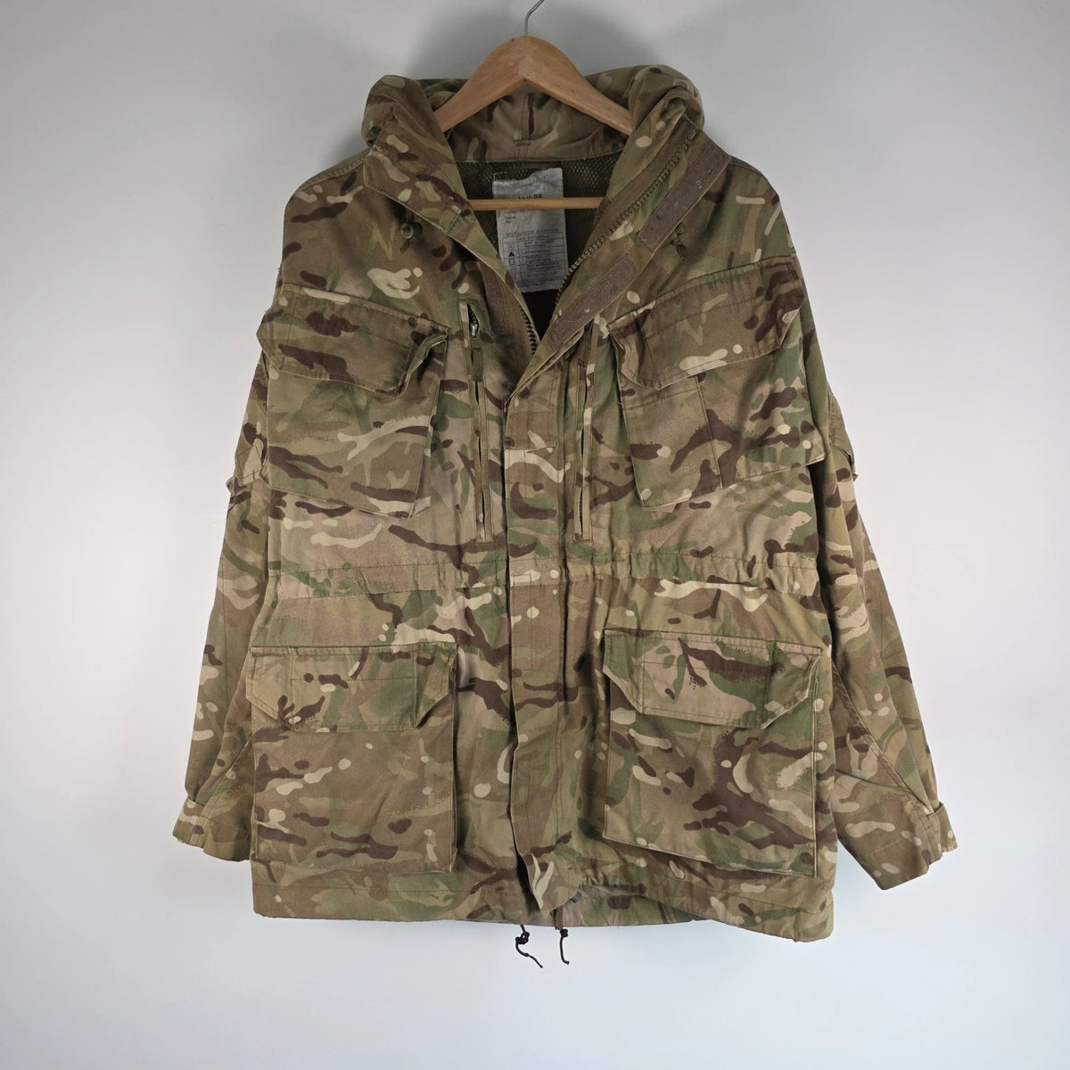 Army green khaki MTP combat smock jacket with Union Jack patch and multiple pockets.