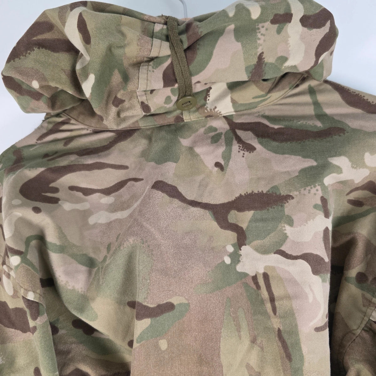 Army green khaki MTP combat smock jacket with Union Jack patch and multiple pockets.