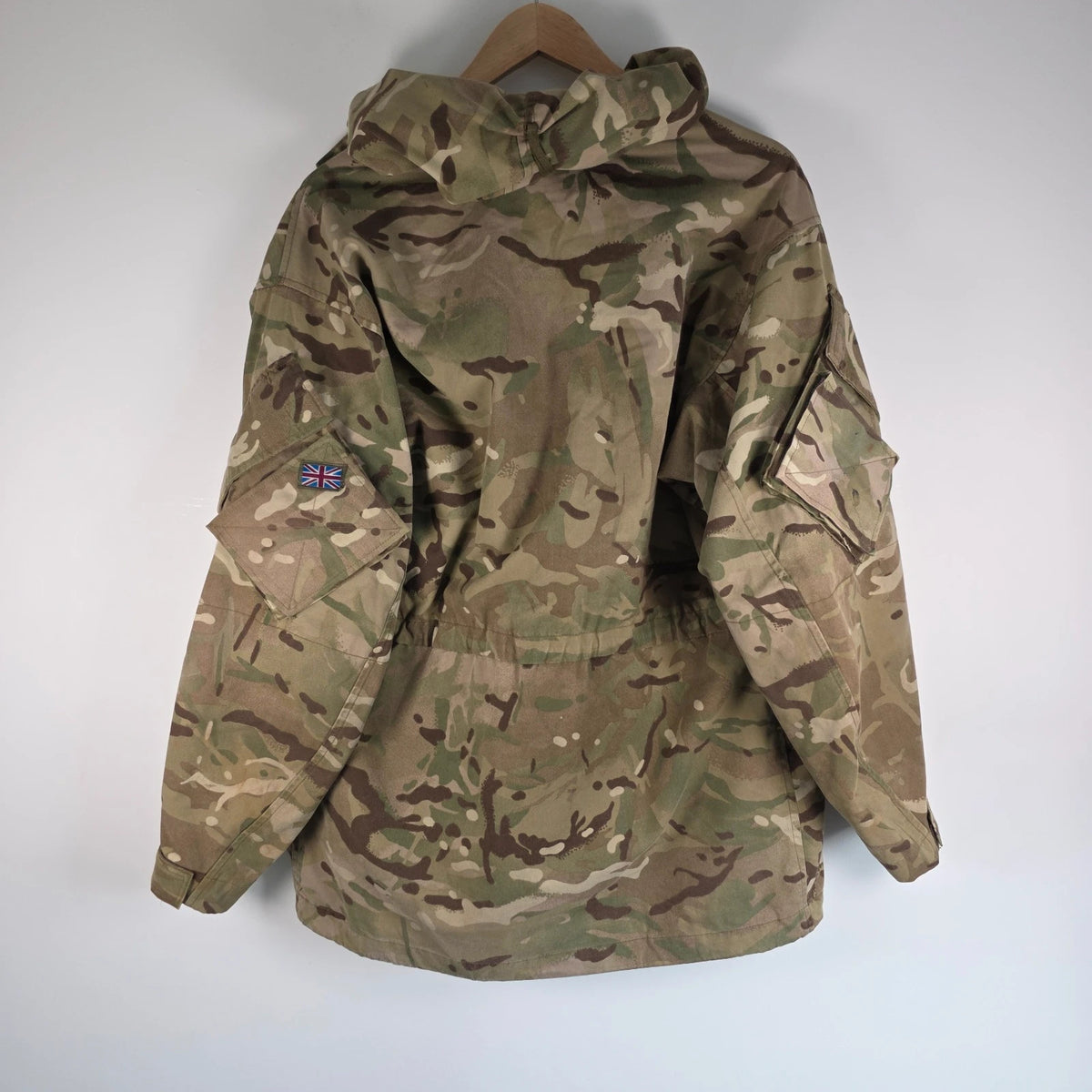 Army green khaki MTP combat smock jacket with Union Jack patch and multiple pockets.