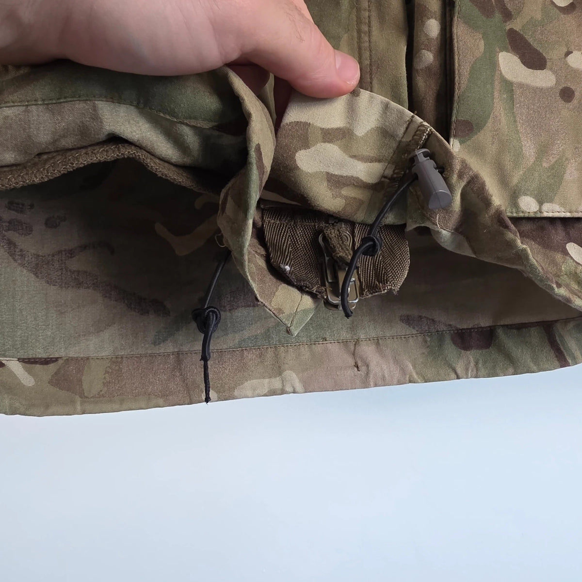 Army green khaki MTP combat smock jacket with Union Jack patch and multiple pockets.