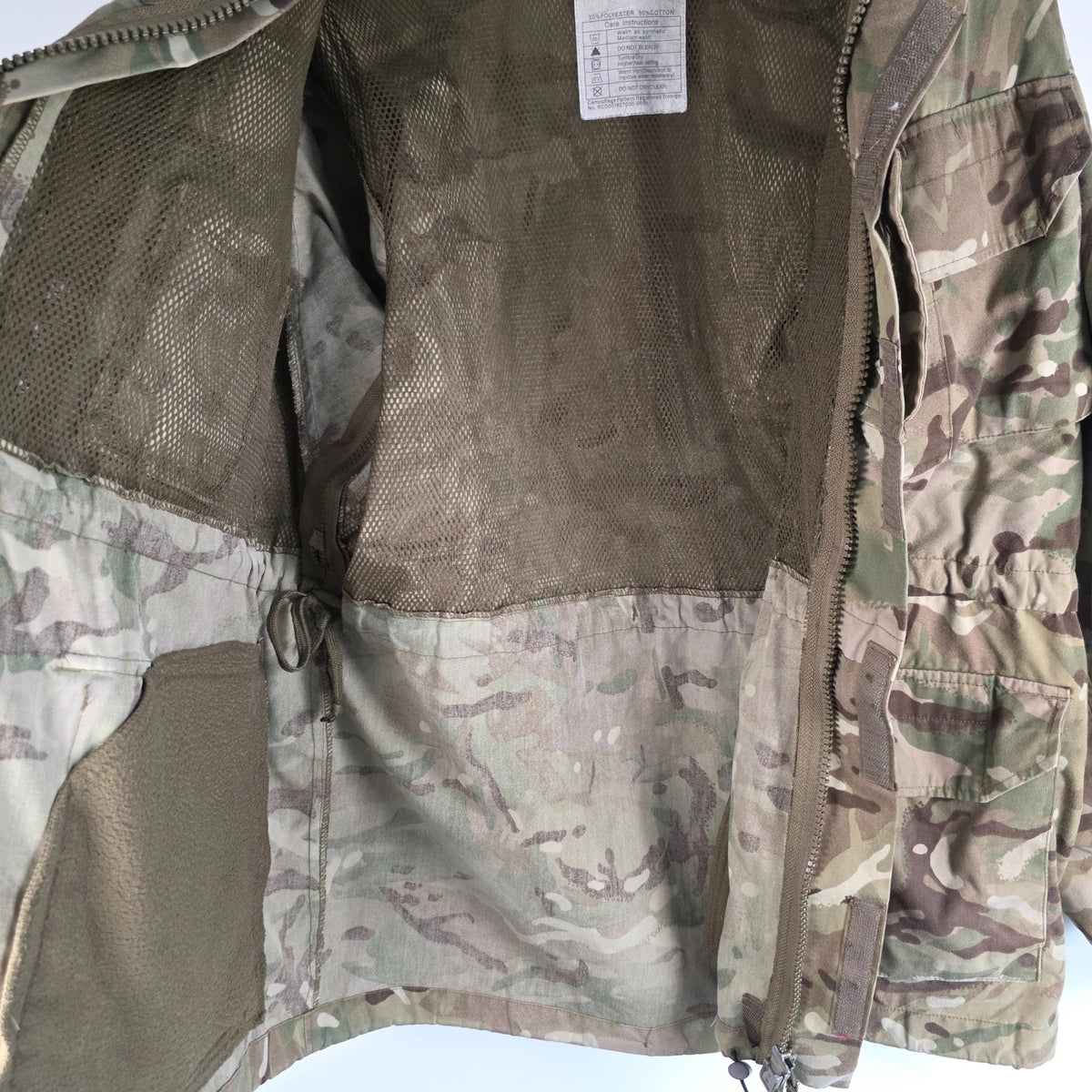 Army green khaki MTP combat smock jacket with Union Jack patch and multiple pockets.