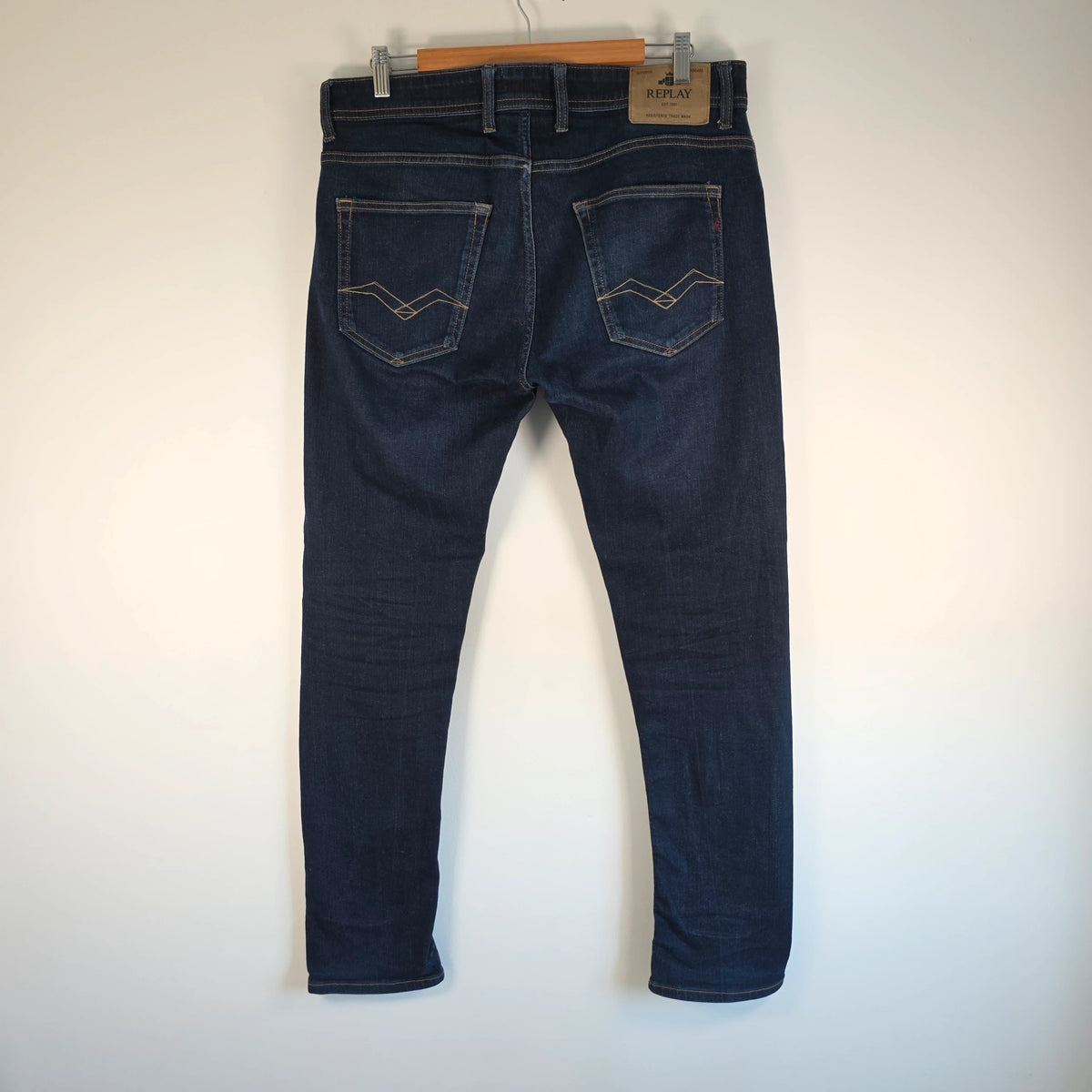 Replay straight leg jeans dark indigo blue stretch denim with embroidered back pockets.