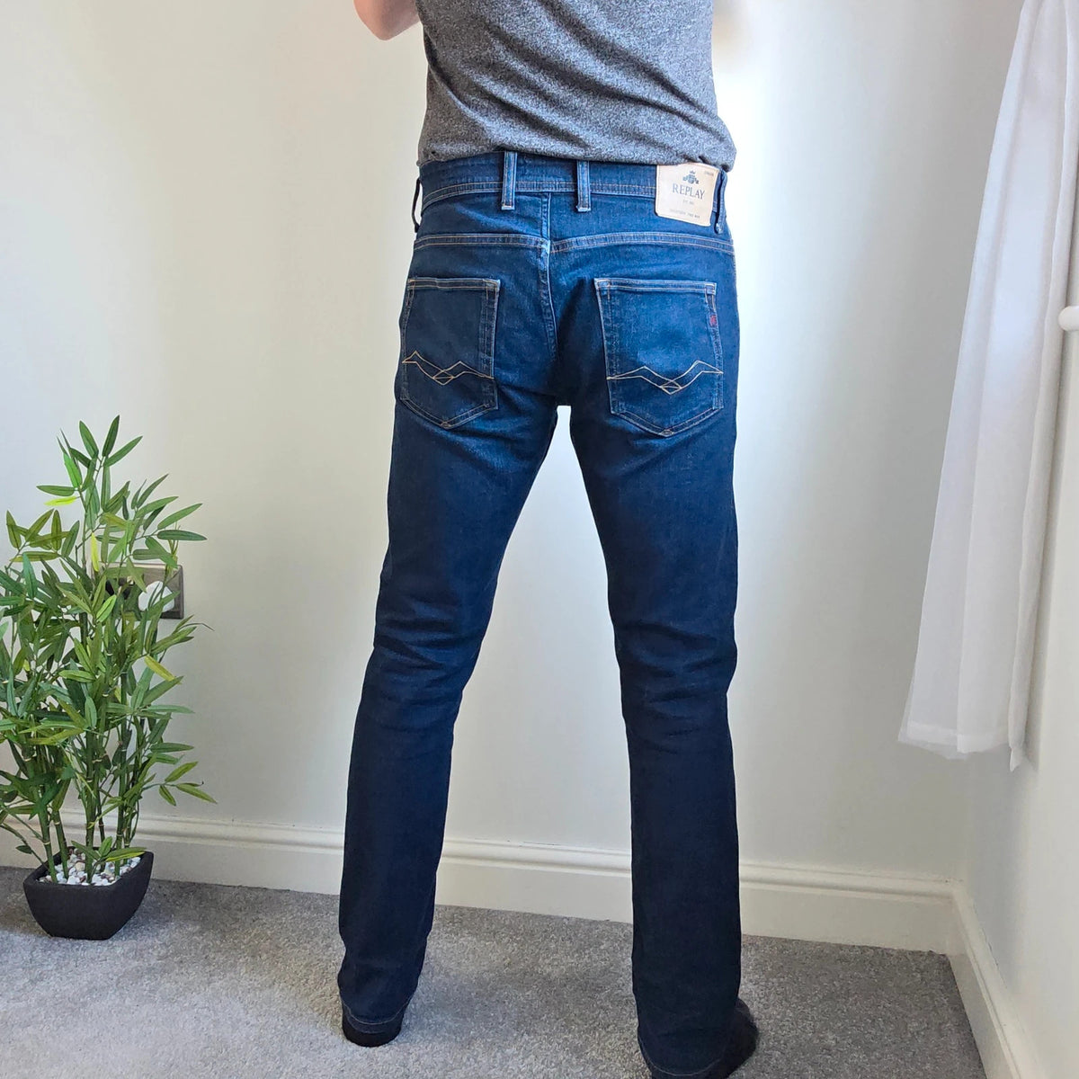 Replay straight leg jeans dark indigo blue stretch denim with embroidered back pockets.