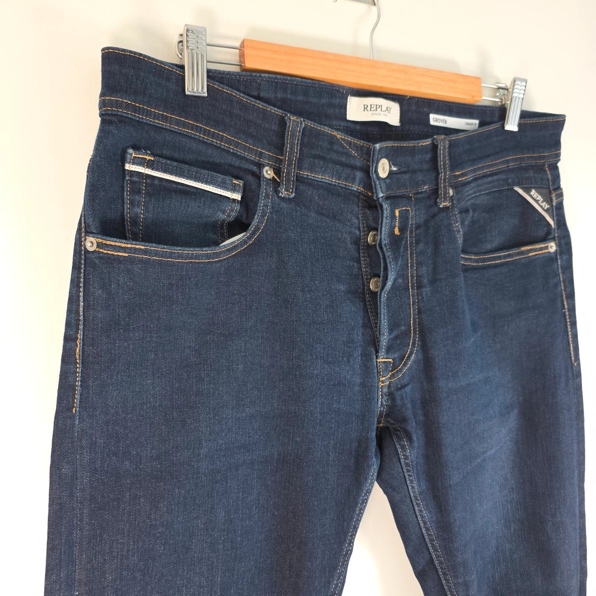 Replay straight leg jeans dark indigo blue stretch denim with embroidered back pockets.