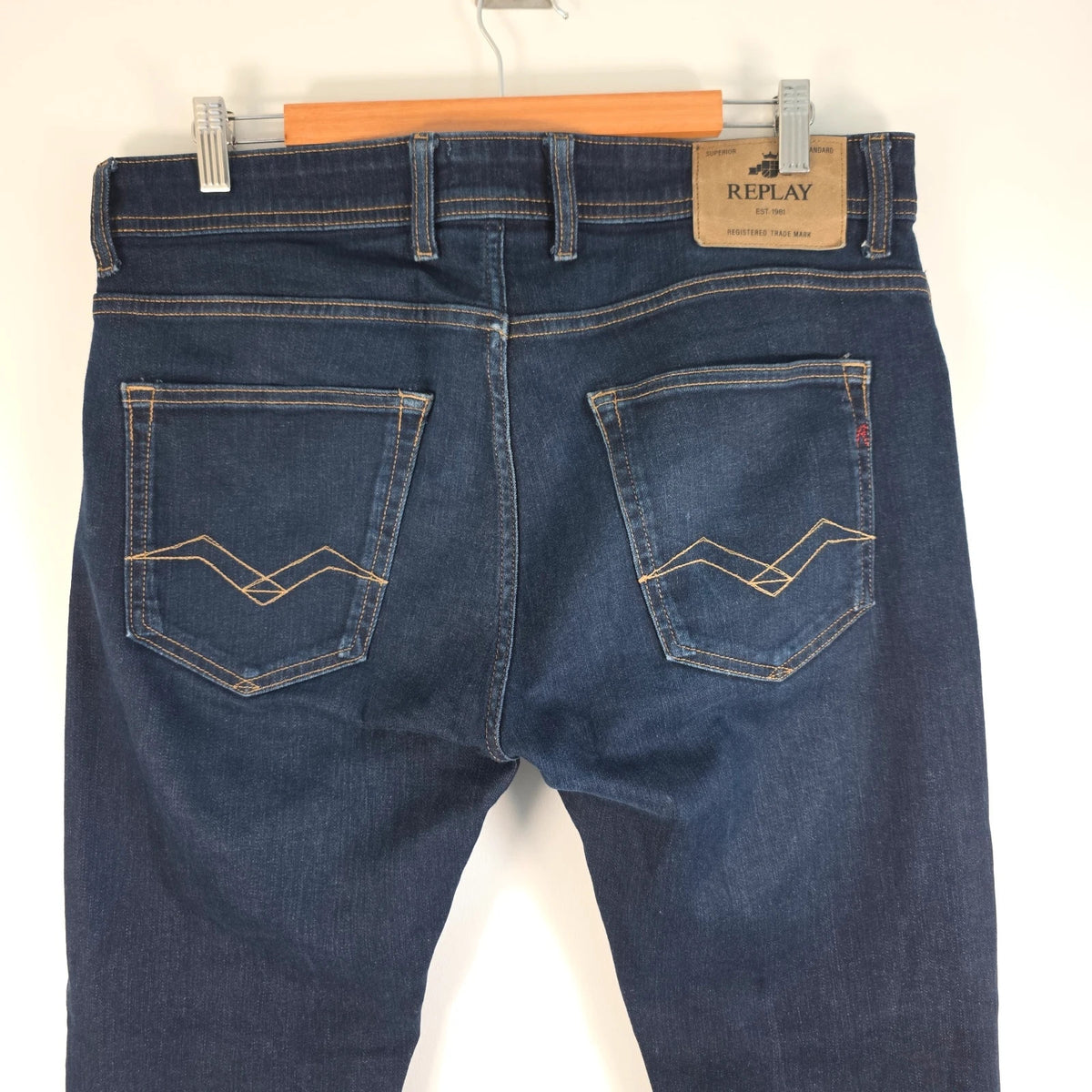 Replay straight leg jeans dark indigo blue stretch denim with embroidered back pockets.