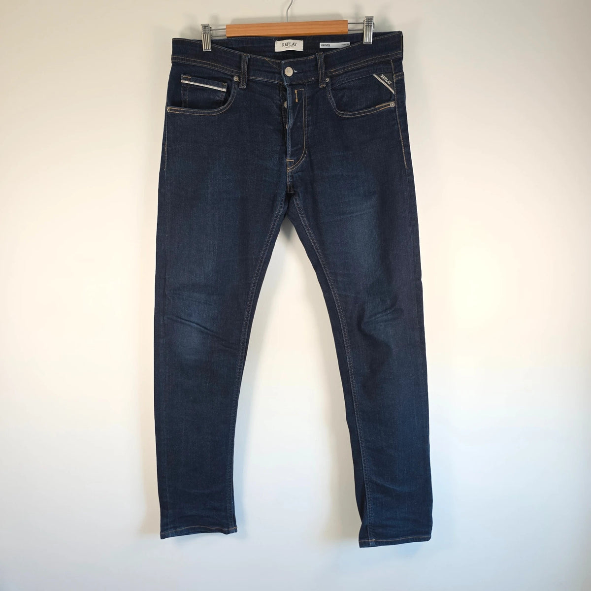 Replay straight leg jeans dark indigo blue stretch denim with embroidered back pockets.