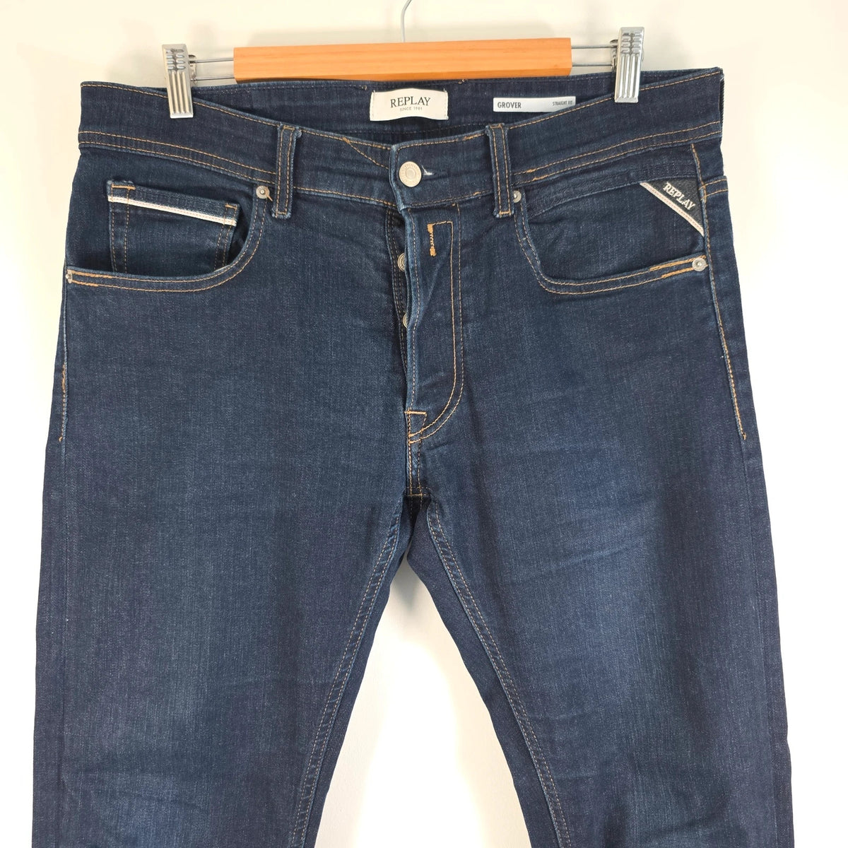 Replay straight leg jeans dark indigo blue stretch denim with embroidered back pockets.
