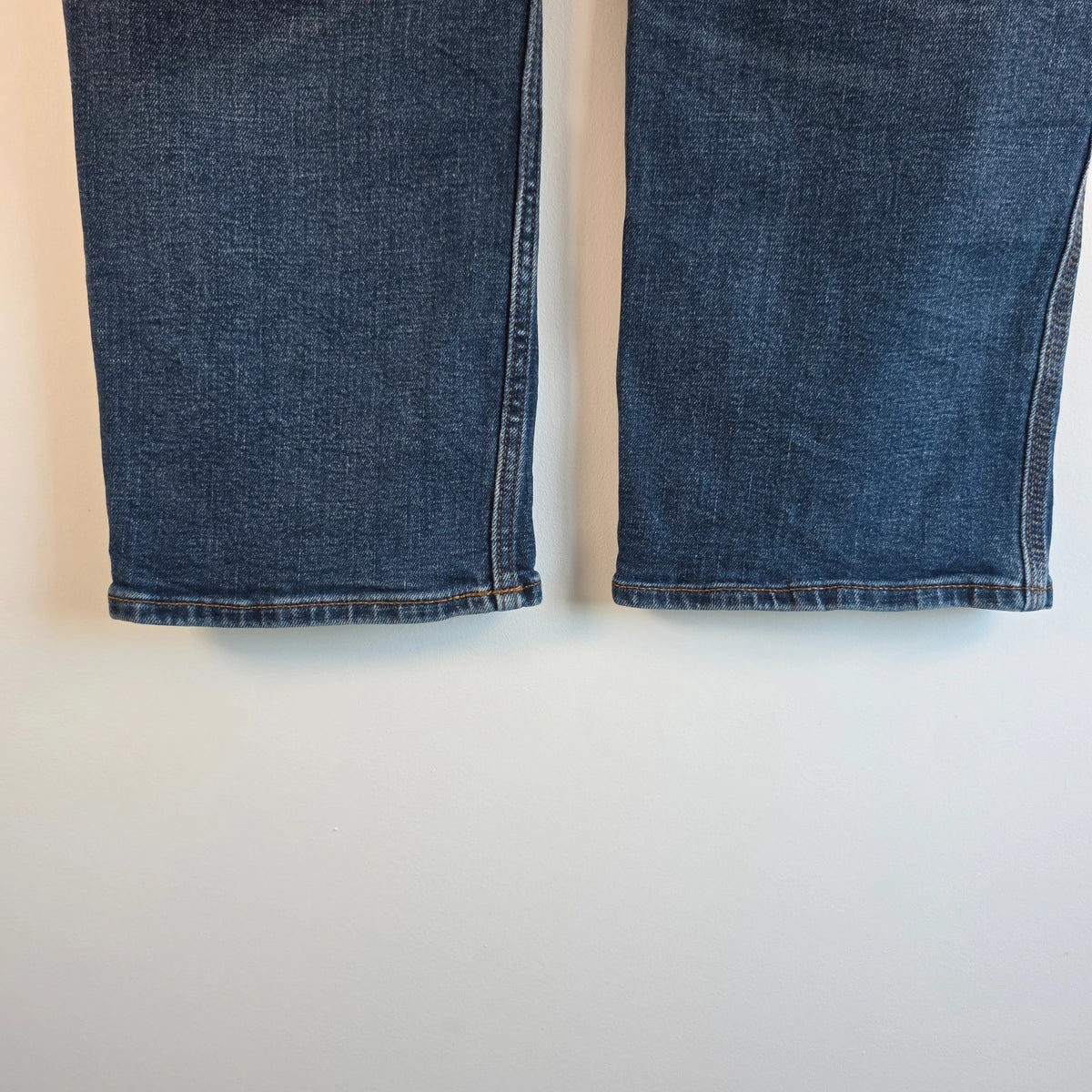 Old Navy blue straight jeans with utility pockets and hammer loop detailing.