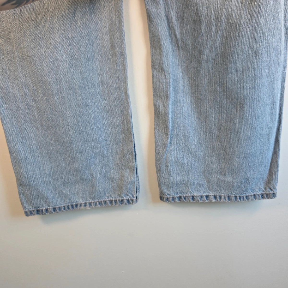 Faded Glory blue straight jeans with utility pockets and hammer loop in light washed denim.