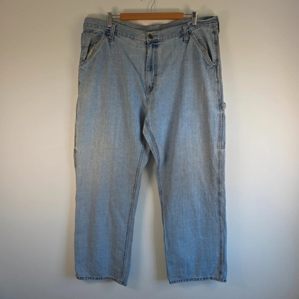 Faded Glory blue straight jeans with utility pockets and hammer loop in light washed denim.