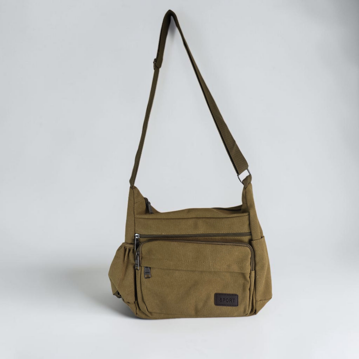 Unbranded multi pocket canvas crossbody bag with adjustable strap and various colors.