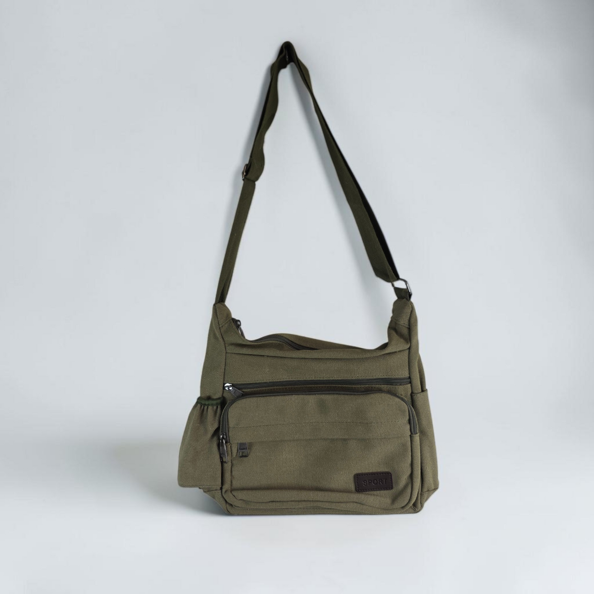 Unbranded multi pocket canvas crossbody bag with adjustable strap and various colors.