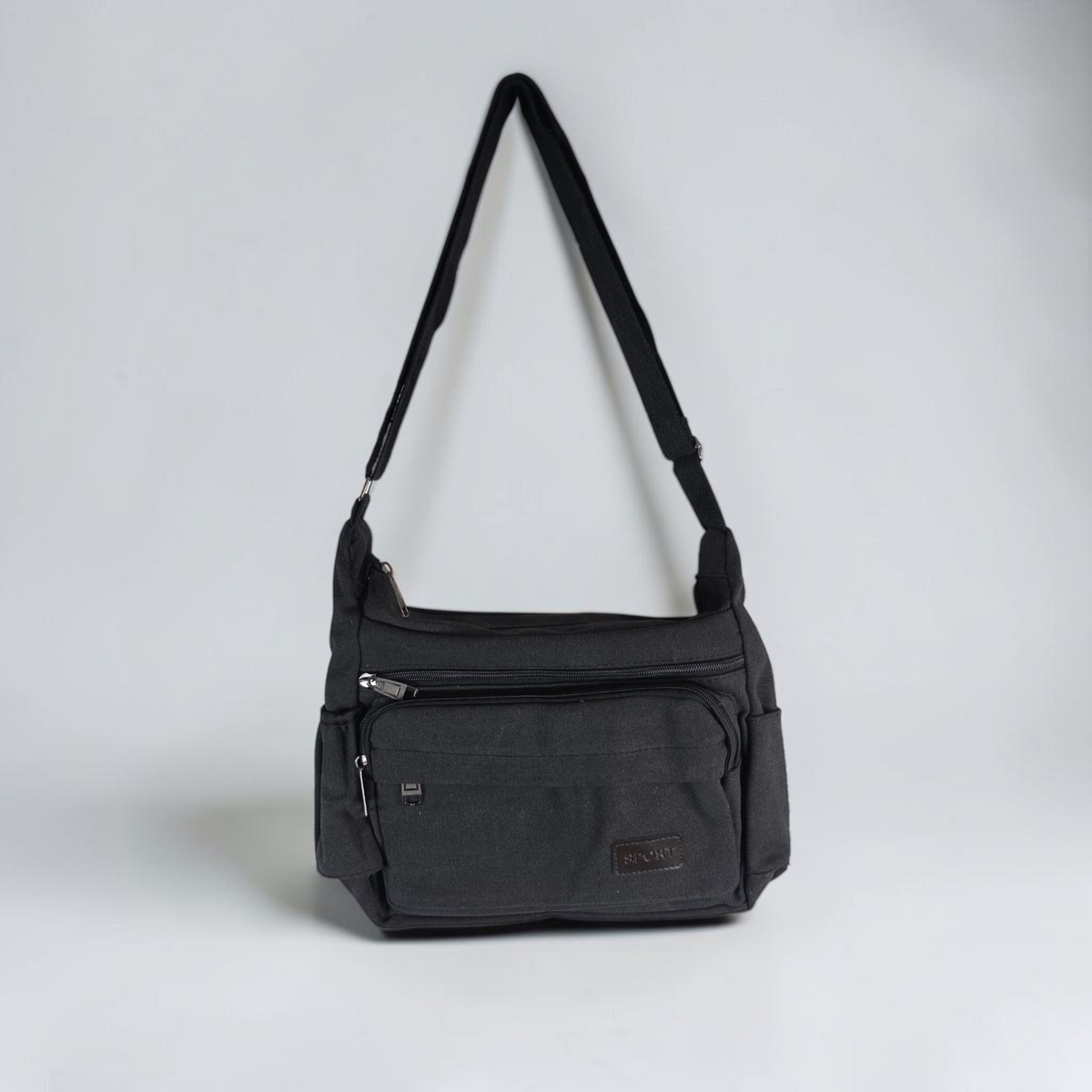 Unbranded multi pocket canvas crossbody bag with adjustable strap and various colors.