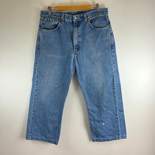 Vintage Levi’s 557 Bootcut Jeans Blue W34 L25 Men’s Distressed Denim