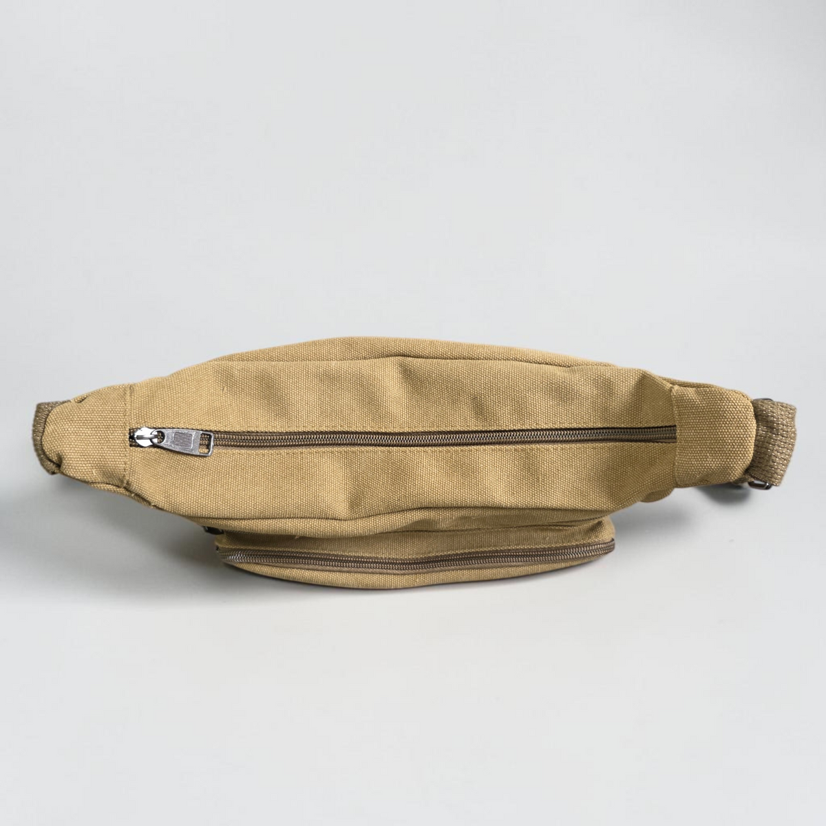 Unbranded multi pocket canvas crossbody bag with adjustable strap and various colors.