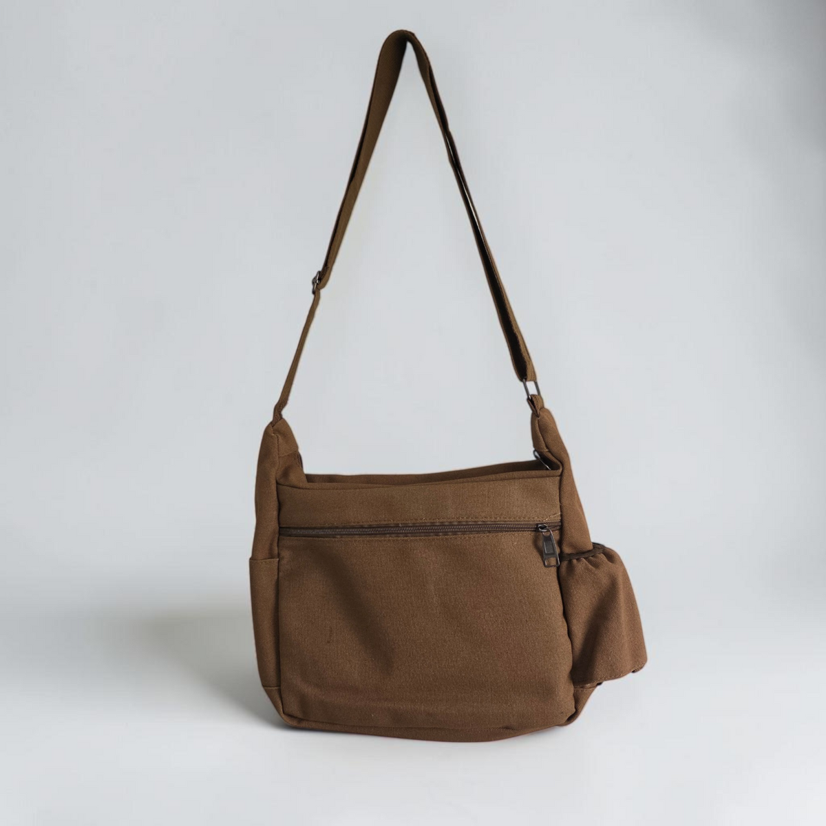 Unbranded multi pocket canvas crossbody bag with adjustable strap and various colors.