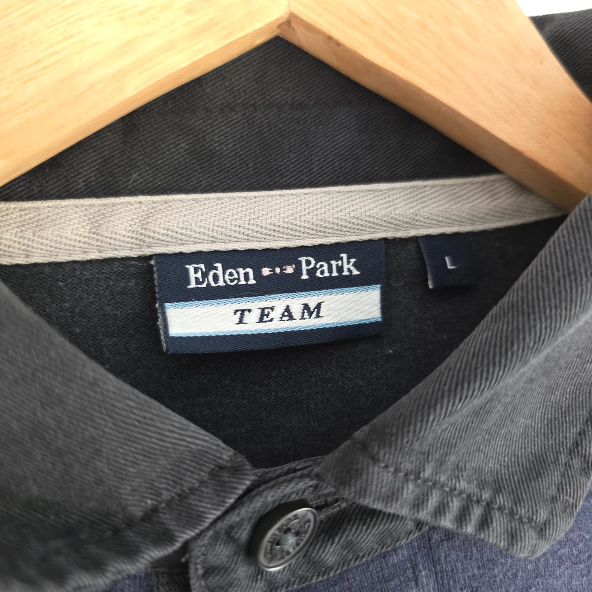 Eden Park navy striped rugby shirt with pink bow tie appliqué and long sleeves.