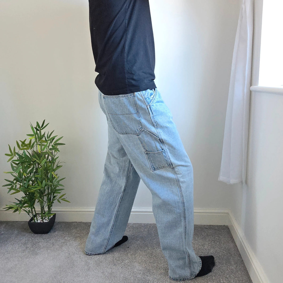Faded Glory blue straight jeans with utility pockets and hammer loop in light washed denim.