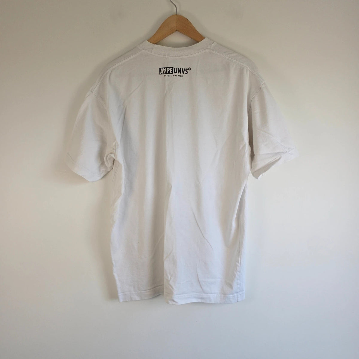 AAPE by A Bathing Ape white graphic T-shirt featuring Ape Universe skull print.