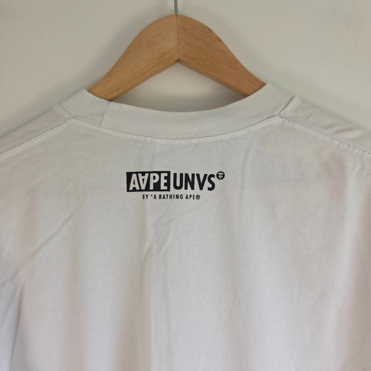 AAPE by A Bathing Ape white graphic T-shirt featuring Ape Universe skull print.