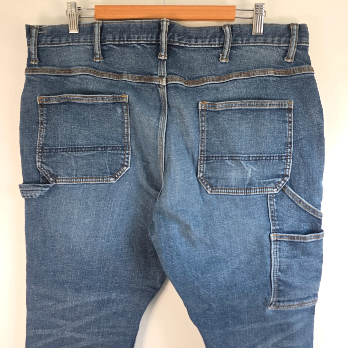 Old Navy blue straight jeans with utility pockets and hammer loop detailing.