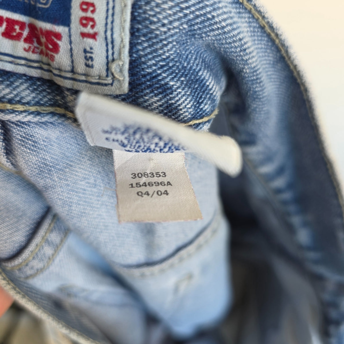 Old Navy blue carpenter jeans with hammer loop and utility pockets, 100% cotton.