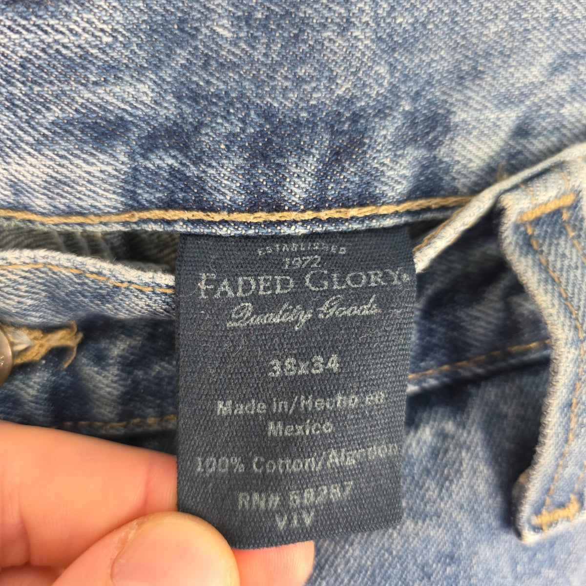 Faded Glory blue carpenter jeans with hammer loop and utility pockets, 100% cotton.
