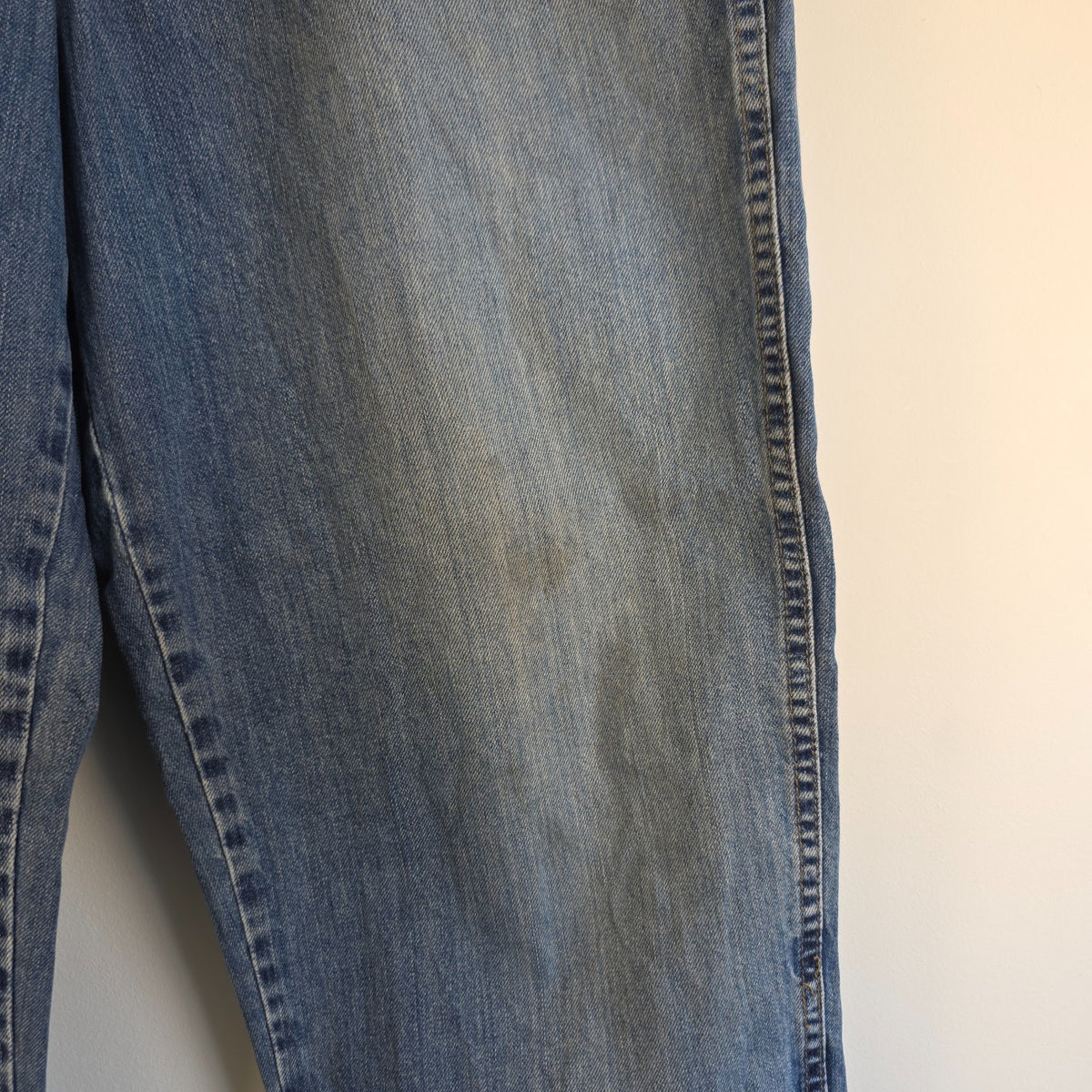 Old Navy blue carpenter jeans with hammer loop and utility pocket detailing.