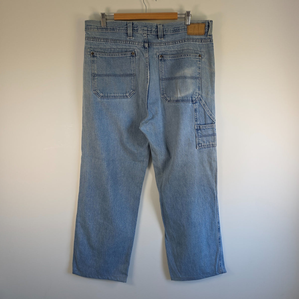 Urban Up blue carpenter jeans with hammer loop and utility pocket detailing.
