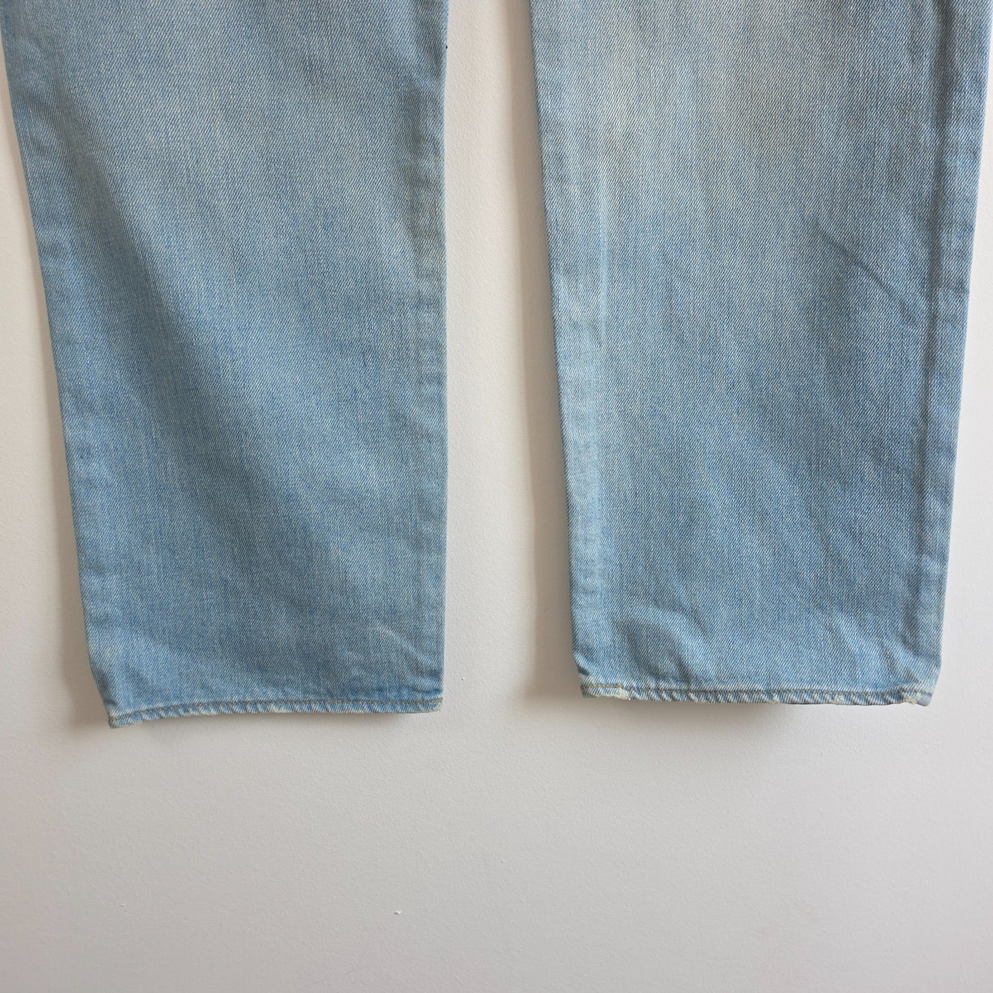 Calvin Klein light blue straight jeans, 100% cotton, classic five-pocket design.