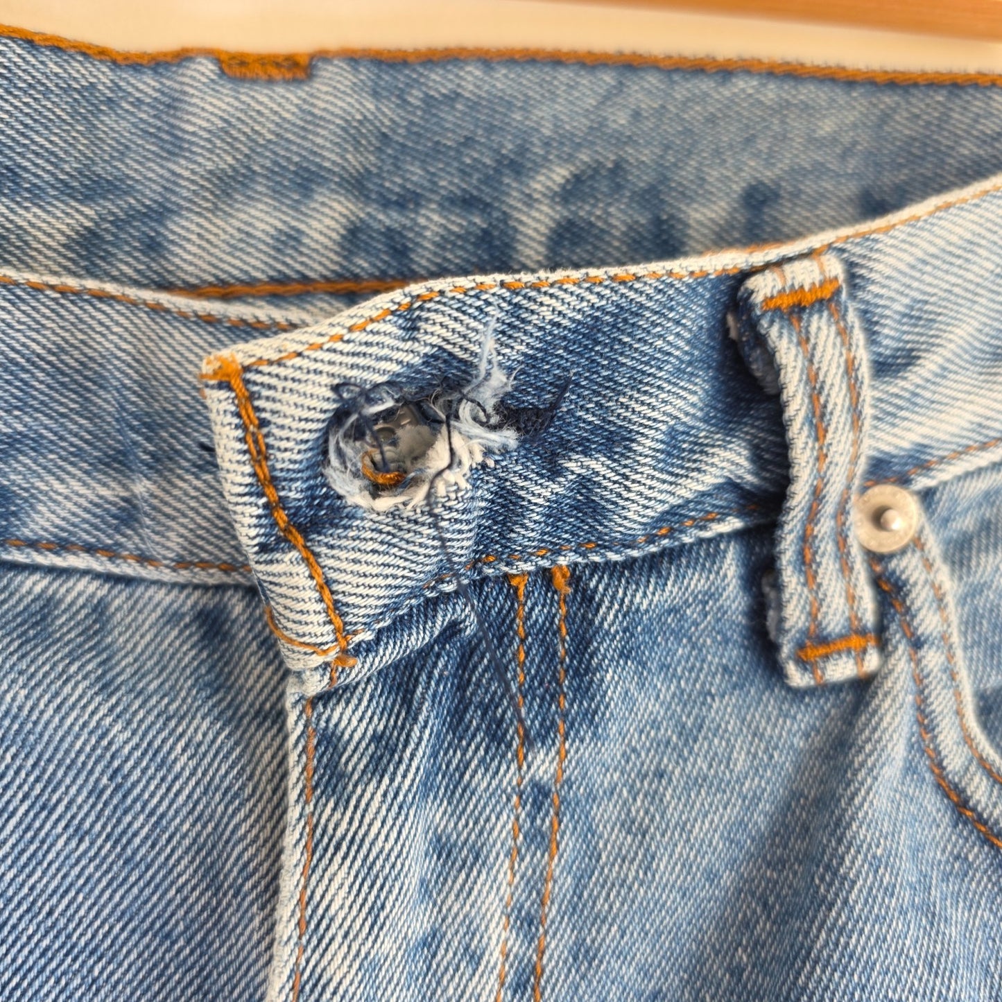 Robe Di Kappa blue straight jeans with vintage wash and subtle logo detail.