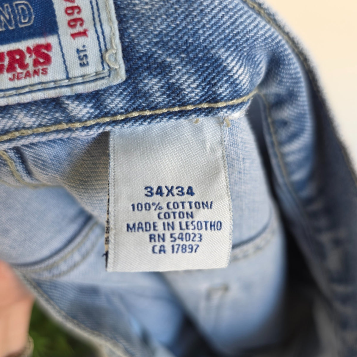 Old Navy blue carpenter jeans with hammer loop and utility pockets, 100% cotton.