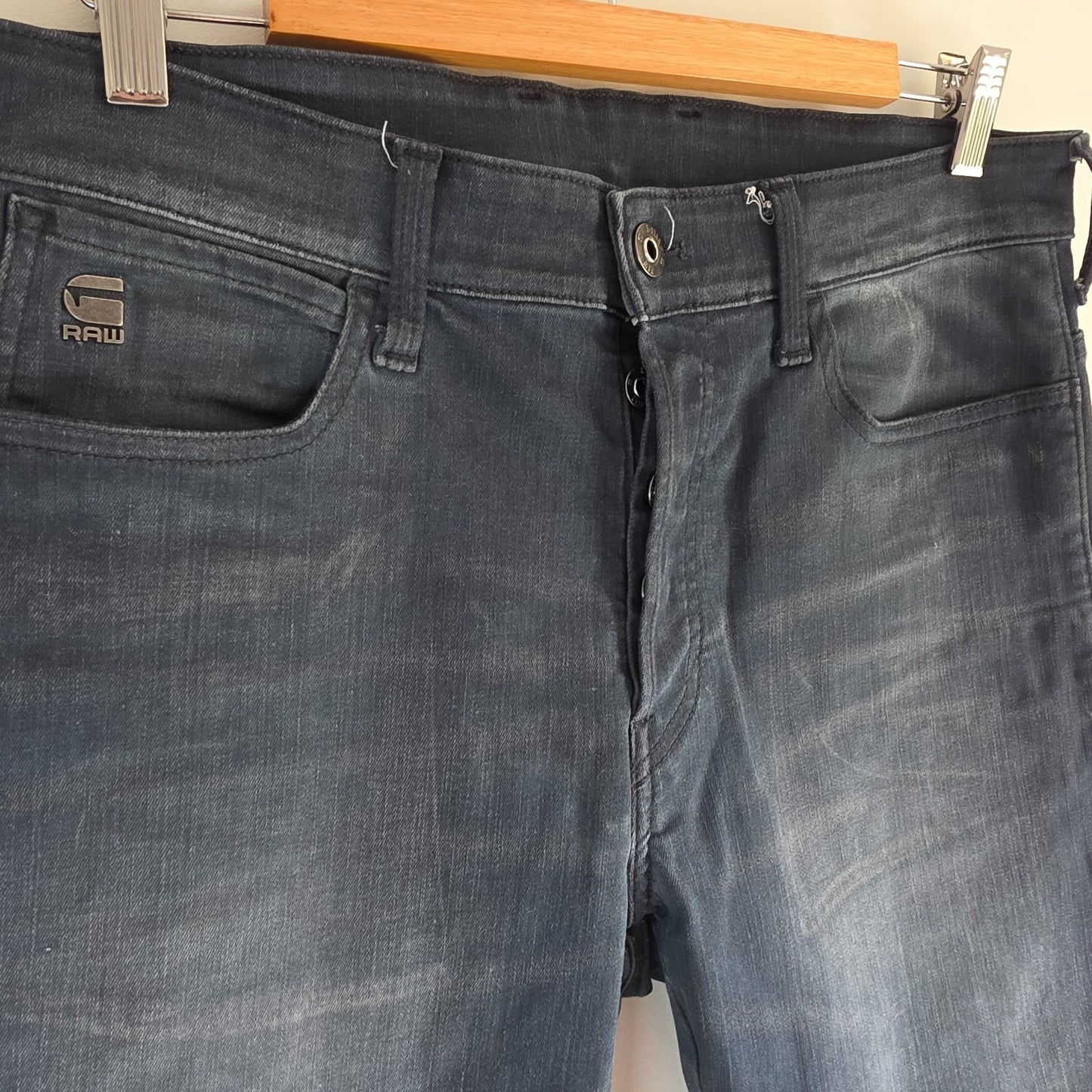 G-Star blue stretch denim slim jeans with biker detailing and logo patch.