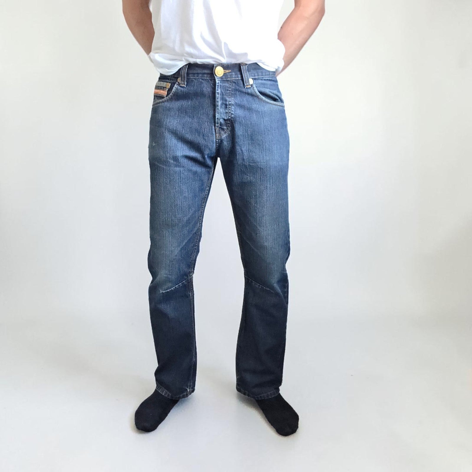 Superdry blue straight jeans with button fly, vintage raw denim, light wear.